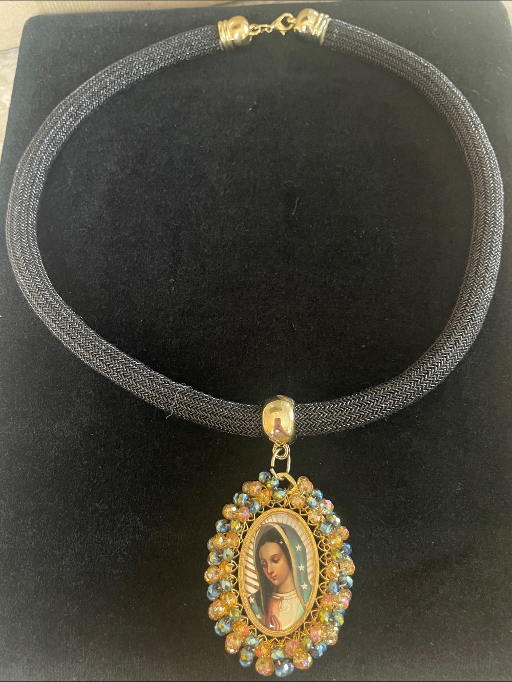 Gorgeous religious necklace soft black material. New without tags!